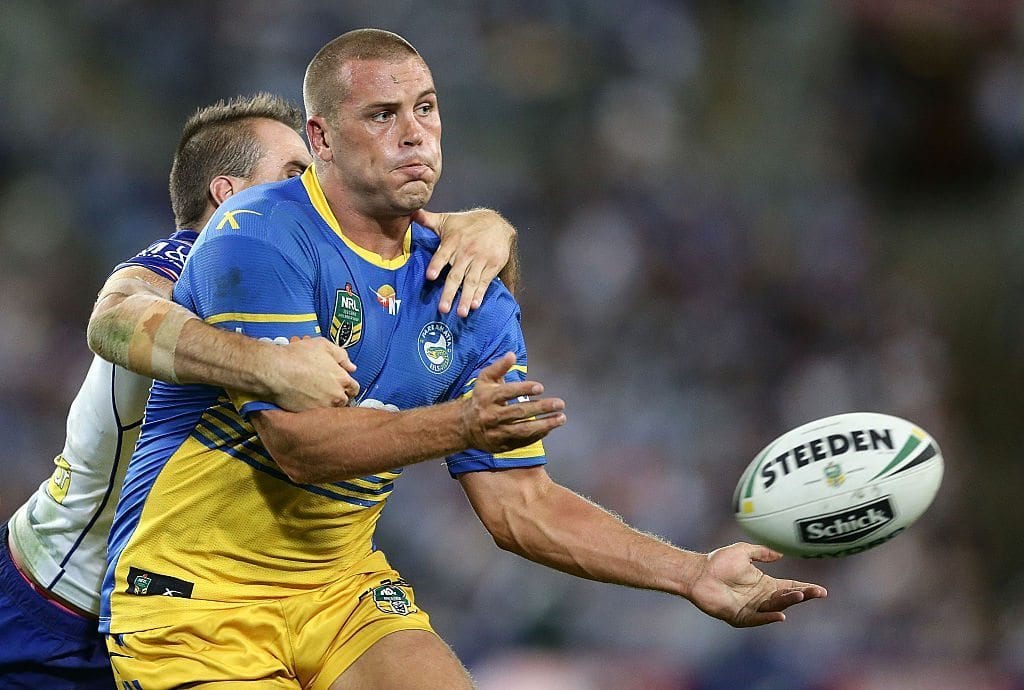 SYDNEY, AUSTRALIA - MARCH 18: Danny Wicks of the Eels passes during the round three NRL match between the Canterbury Bulldogs and the Parramatta Eels at ANZ Stadium on March 18, 2016 in Sydney, Australia. (Photo by Mark Metcalfe/Getty Images)