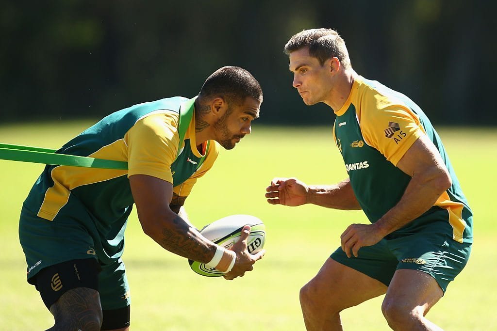 SYDNEY, AUSTRALIA - MARCH 23: Frank Winterstein is tackled by captain Ed Jenkins during an Australian Sevens training session at the Sydney Academy of Sport on March 23, 2016 in Sydney, Australia. (Photo by Cameron Spencer/Getty Images)