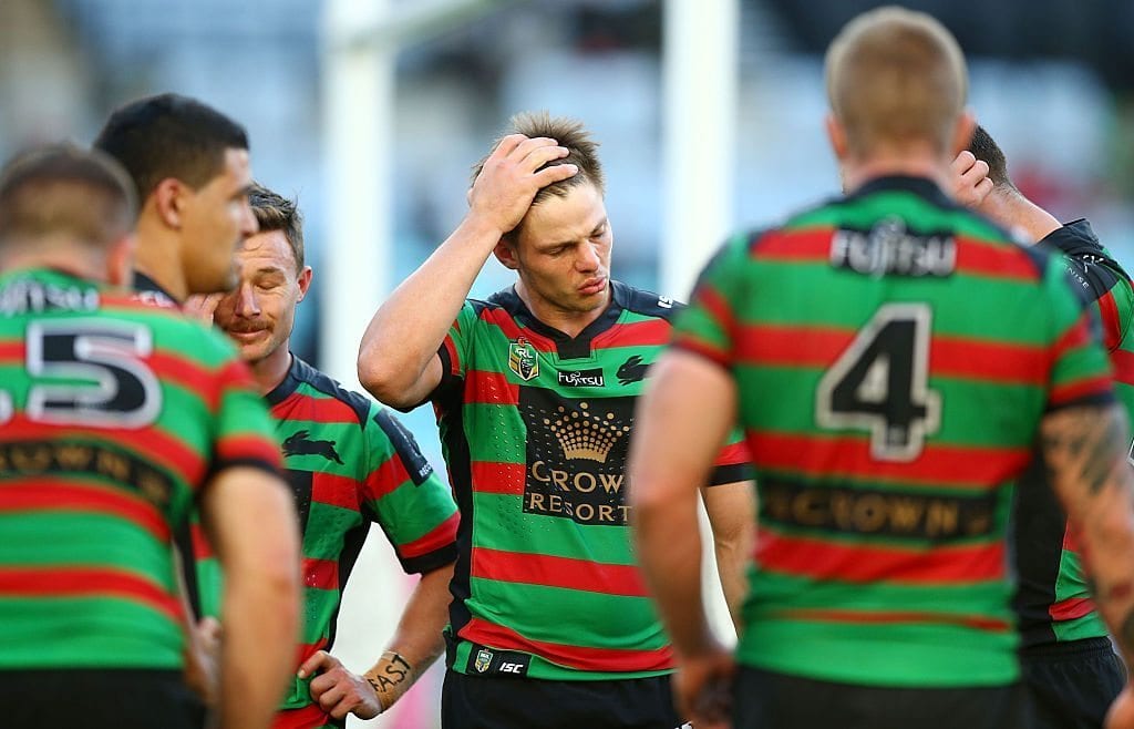 SYDNEY, AUSTRALIA - JULY 31: Rabbitohs players look dejected after a Raiders try during the round 21 NRL match between the South Sydney Rabbitohs and the Canberra Raiders at ANZ Stadium on July 31, 2016 in Sydney, Australia.  (Photo by Mark Nolan/Getty Images)