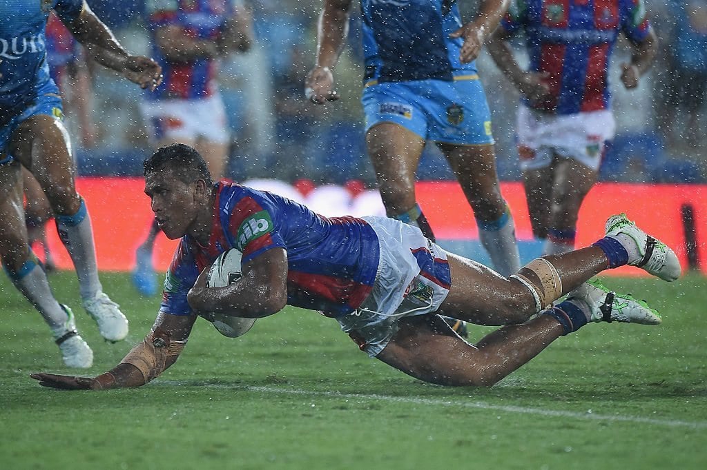 GOLD COAST, AUSTRALIA - MARCH 06: Daniel Safiti of the Knights scores a try during the round one NRL match between the Gold Coast Titans and the Newcastle Knights at Cbus Super Stadium on March 6, 2016 on the Gold Coast, Australia. (Photo by Matt Roberts/Getty Images)