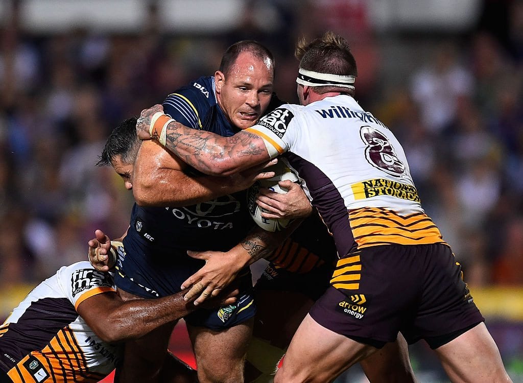 TOWNSVILLE, AUSTRALIA - MAY 20:  Matthew Scott of the Cowboys is tackled by Josh McGuire and Corey Parker of the Broncos during the round 11 NRL match between the North Queensland Cowboys and the Brisbane Bronocs at 1300SMILES Stadium on May 20, 2016 in Townsville, Australia.  (Photo by Ian Hitchcock/Getty Images)