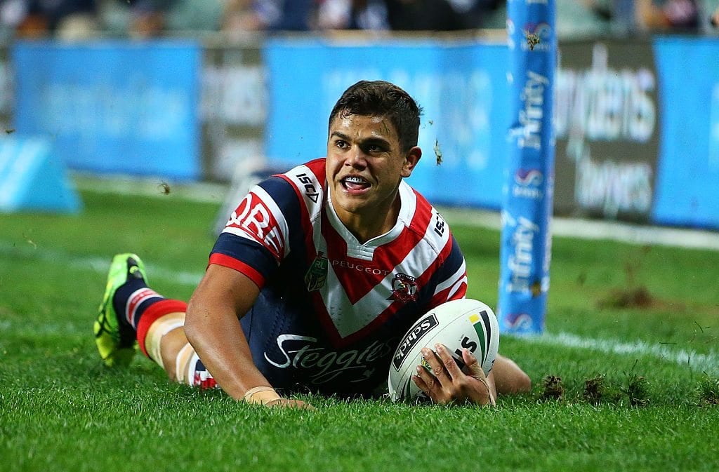 SYDNEY, AUSTRALIA - JUNE 30: Latrell Mitchell of the Roosters dives to score a try during the round 17 NRL match between the Sydney Roosters and the Canterbury Bulldogs at Allianz Stadium on June 30, 2016 in Sydney, Australia. (Photo by Mark Nolan/Getty Images)