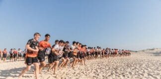 Tigers trade football field for sand dunes