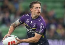 MELBOURNE, AUSTRALIA - MARCH 20: Cameron Munster of the Storm runs the ball during the round three NRL match between the Melbourne Storm and Penrith Panthers at AAMI Park on March 20, 2025, in Melbourne, Australia. (Photo by Daniel Pockett/Getty Images)
